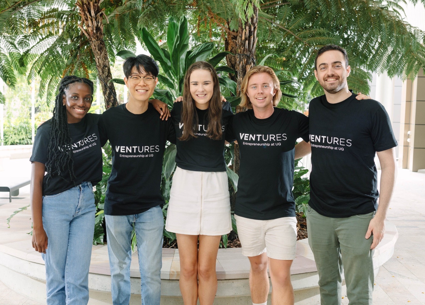 Ventures Ambassador 2023 standing in front of plants