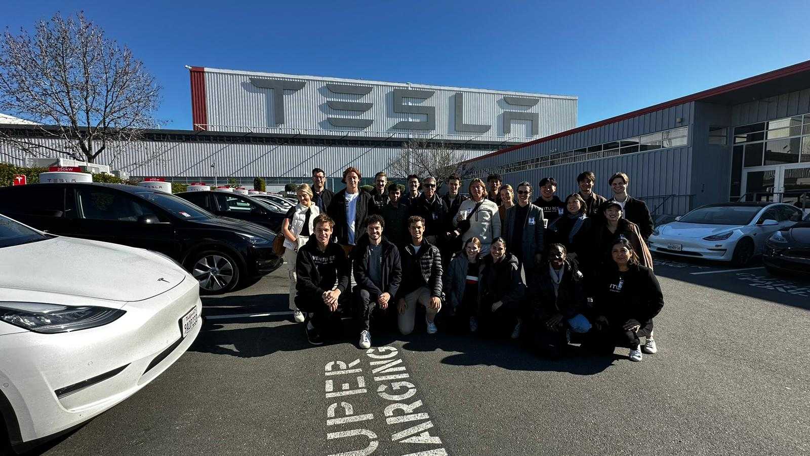 San Fan Startup AdVenturers outside Tesla