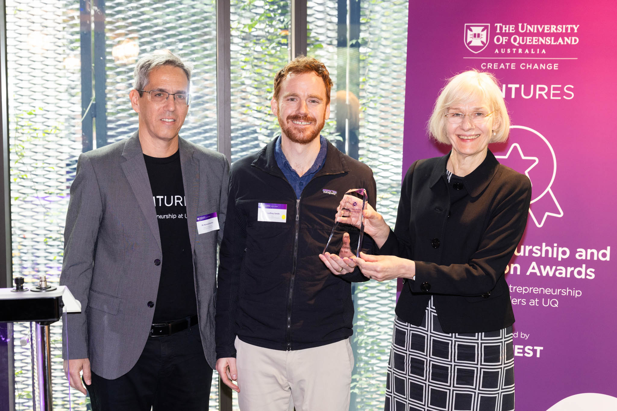 ASA CEO Geoff Smith holding his award