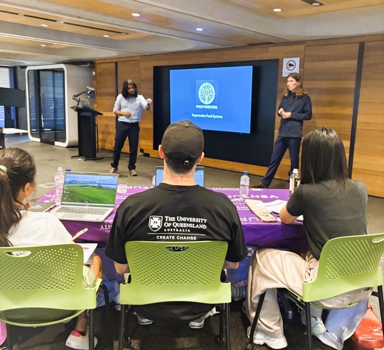 Students pitching to a panel of judges