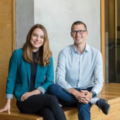 bloom impact investment founders sitting for portrait
