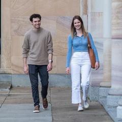 Tom Bizzell and Lara Berge in the great court sandstone in background