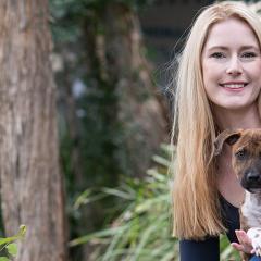Zoe Black with a puppy