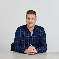 Daniel Flynn Founder of Thankyou sitting at table