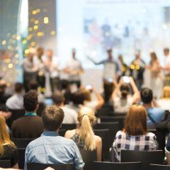 People sitting in audience at award
