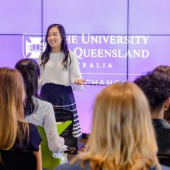 Student pitching in front of crowd