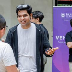 people networking and talking with hands