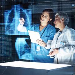 medical professionals looking at xray