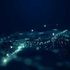 dark blue image of connected green dots to look like electronics and systems
