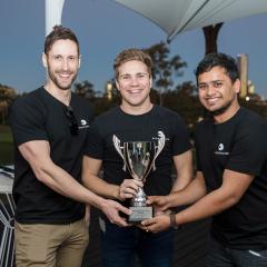 SportsCube co-founders with their winning trophy. 