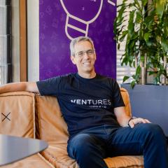 Nimrod Klayman sitting on couch in Ventures GCI space 
