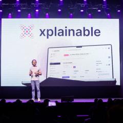 Xplainable founder Jamie Tuppack on stage at ilab Pitch Night